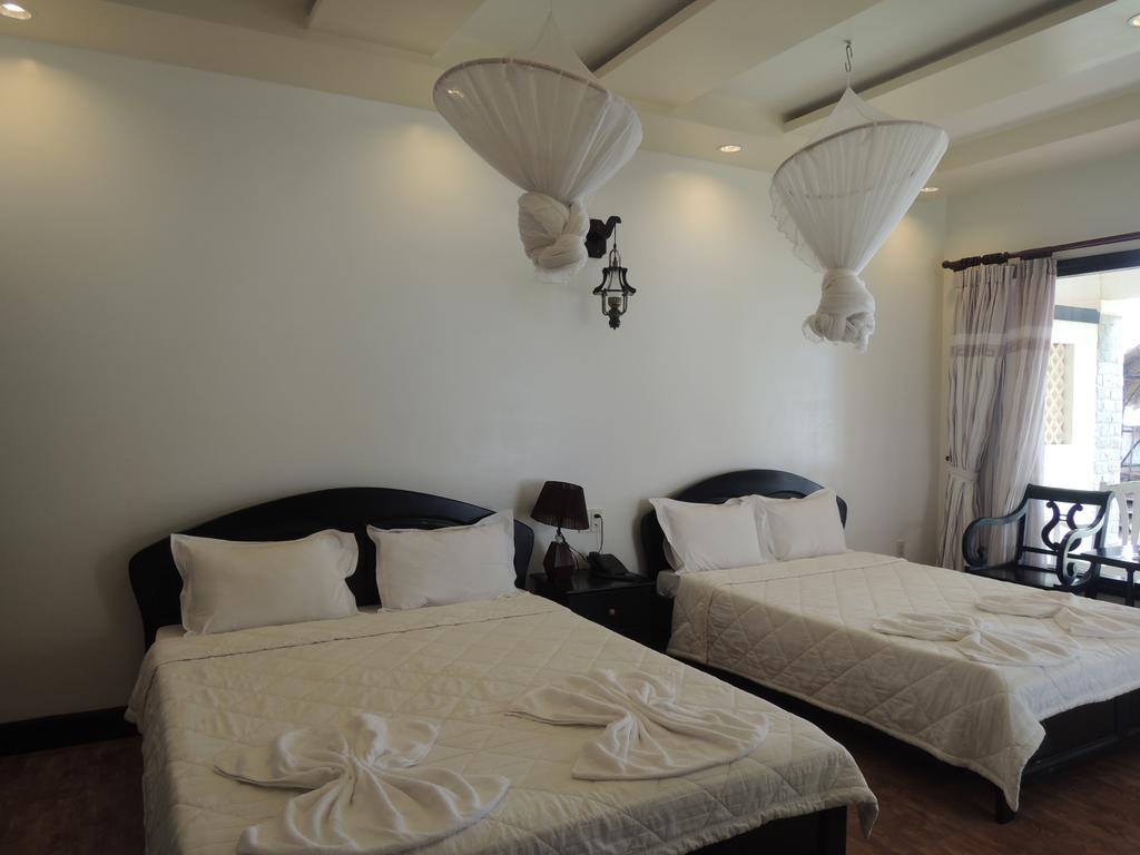 Ngoc Bich Bungalow Hotel Phan Thiet Quarto foto