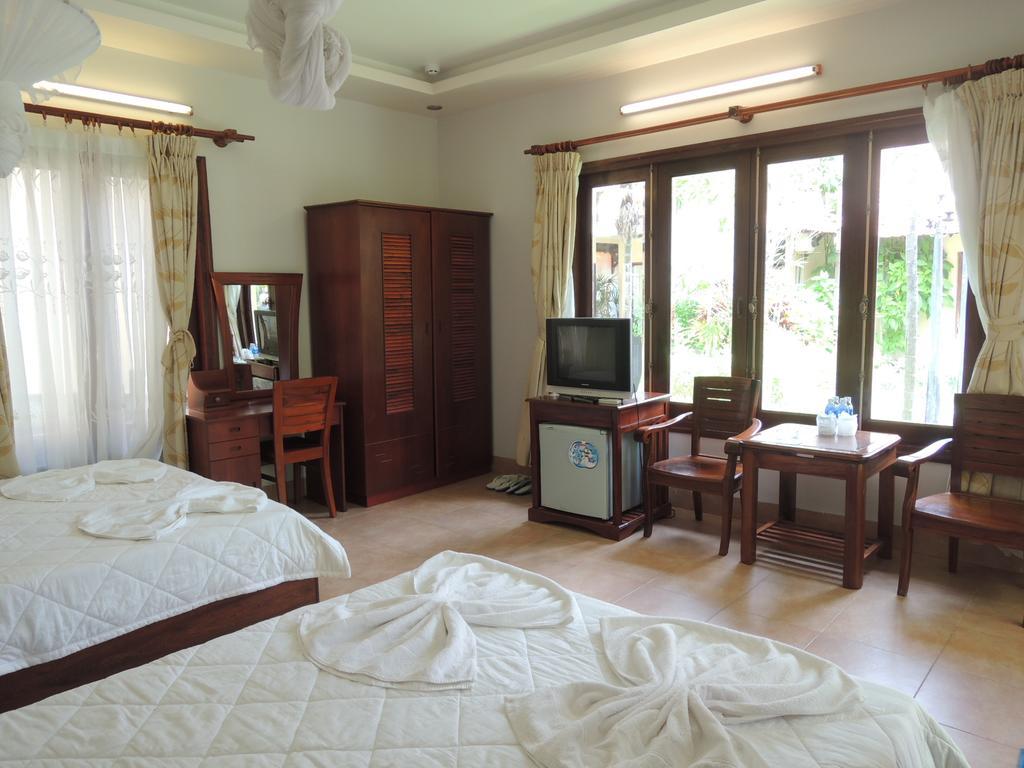 Ngoc Bich Bungalow Hotel Phan Thiet Quarto foto