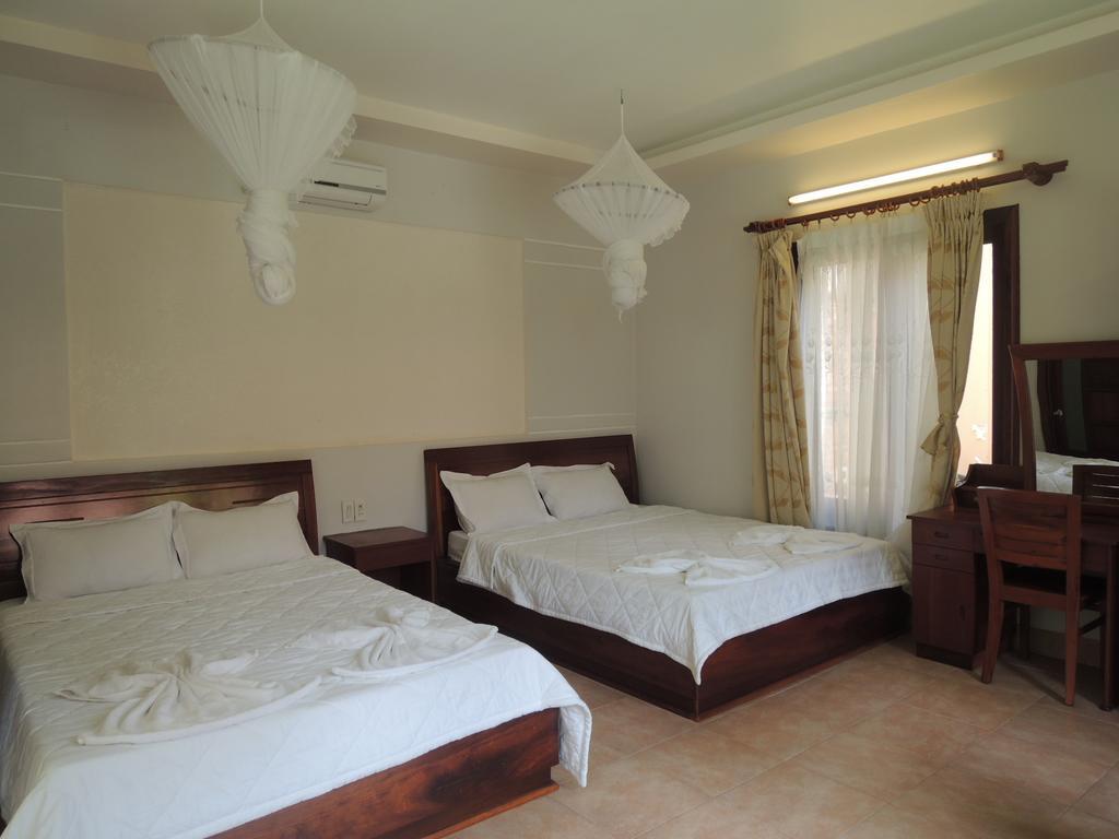 Ngoc Bich Bungalow Hotel Phan Thiet Quarto foto