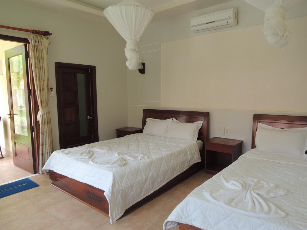 Ngoc Bich Bungalow Hotel Phan Thiet Quarto foto